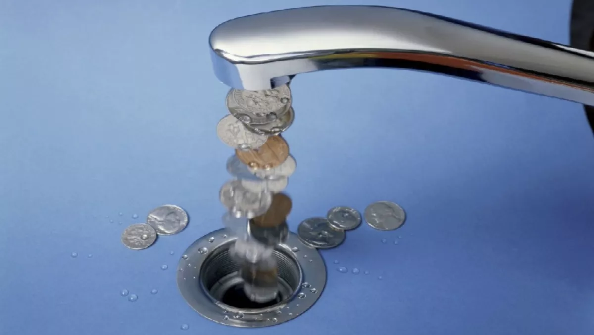 Money flowing from tap